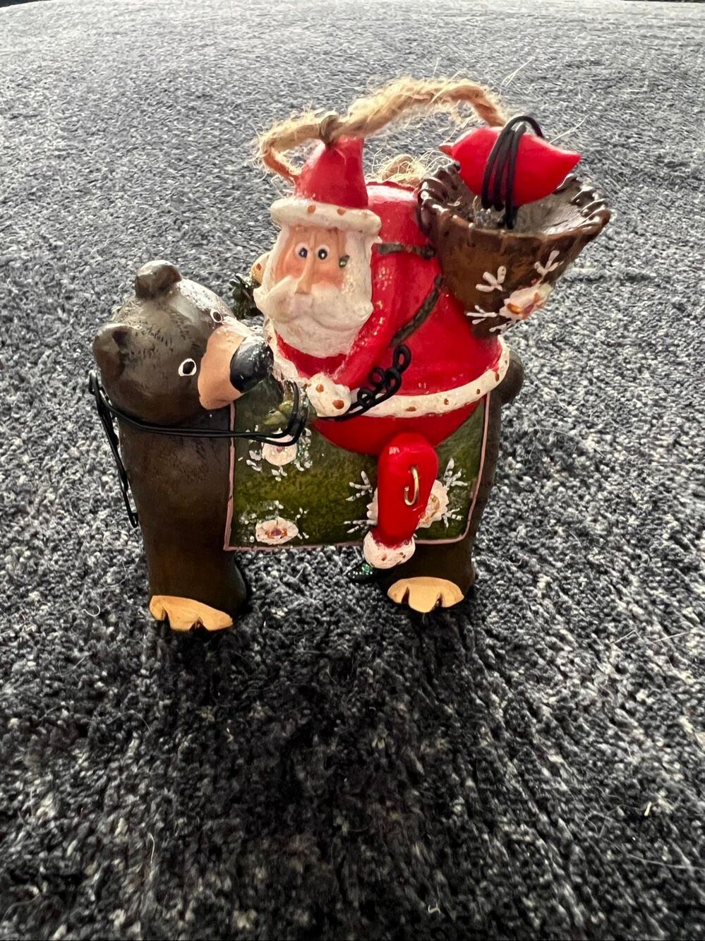 Santa Claus Riding a Bear Christmas Ornament